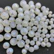 Wholesale of 100PCS PACK Resin Moonlight Beads, Colorful Pearls, Half Hole Round Beads Online Hot Sale