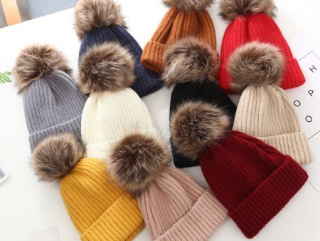 Wholesale of Winter Parent-child Large Wool Ball Knitted Hats and Wool Hats Cheap