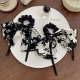 Wholesale Black and White Floral Bow Fabric Large Intestine Hair Tie Fashion